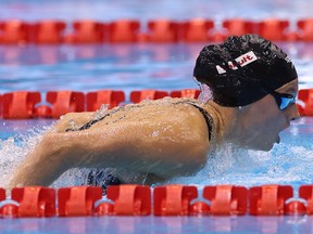Summer McIntosh swims during a race in the pool