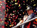 Race winner Max Verstappen of the Netherlands and Oracle Red Bull Racing celebrates on the podium during the F1 Grand Prix of Belgium at Circuit de Spa-Francorchamps on Sunday, July 30, 2023, in Spa, Belgium.