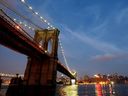 The Brooklyn Bridge, the construction of which began in 1869 and took 14 years to finish, used 15,000 miles of hot galvanized iron to form the cables that suspended the bridge from its two large towers.