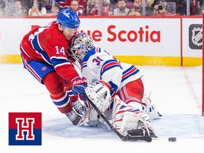 Photo of a Montreal Canadiens player crashing into a New York Rangers goaltender