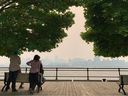 Montreal's skyline is pictured from Parc Jean-Drapeau with smoke caused by wildfires on June 25, 2023. 