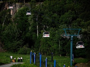 A row of chairlifts