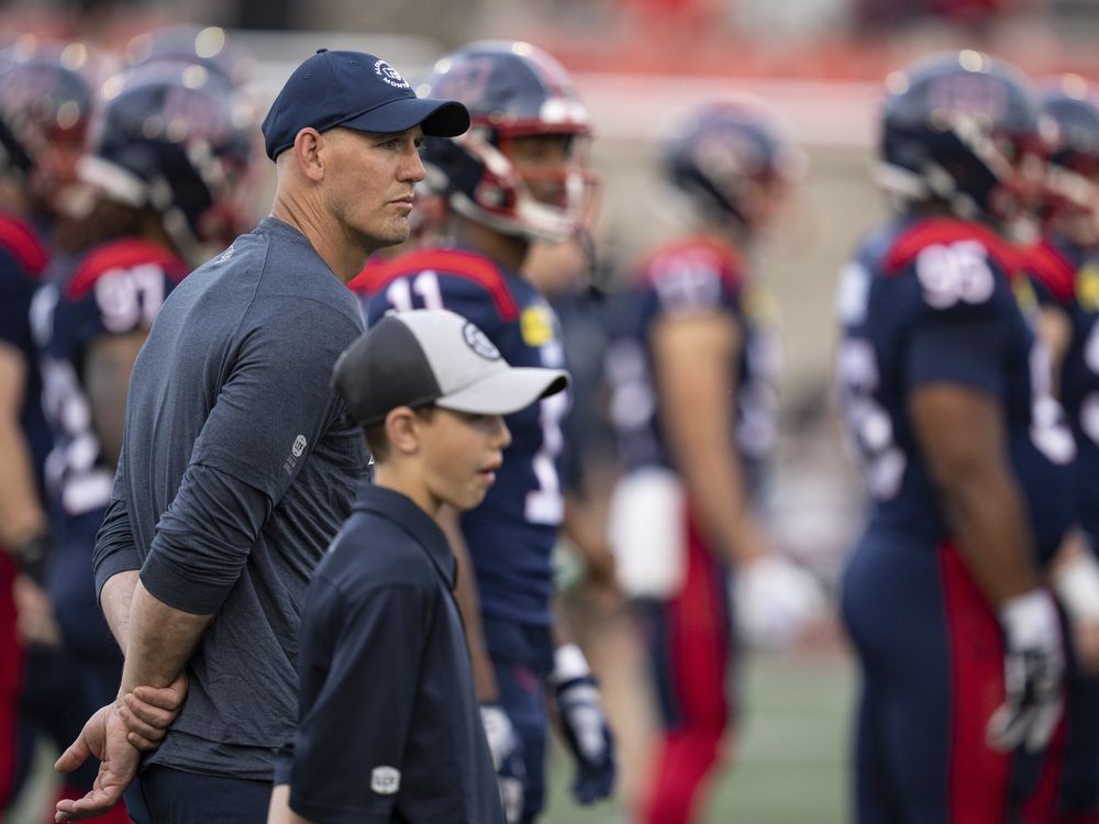 Montreal, Canada. 01st July, 2023. Montreal Alouettes quarterback Cody  Fajardo (7) hands off to running back William Stanback during first half  CFL football action against the Winnipeg Blue Bombers in Montreal, Saturday