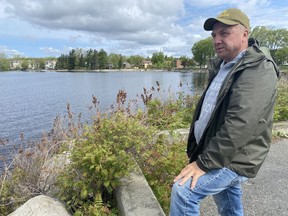 Pierre Grenier, president of the Lac-Megantic anglers association, is shown in downtown Lac-Megantic, Que., on Friday, May 26, 2023. Grenier says that ever since the 2013 train derailment in Lac-Megantic, Que., spilled 100,000 litres of crude oil into the Chaudière River, the fishing hasn't been as good.