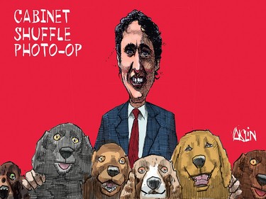 Cartoon of Justin Trudeau behind a row of puppies with the headline "Cabinet shuffle photo-op"