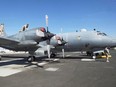 Members of the Canadian Forces work on a CP-140 Aurora surveillance plane at the Canadian Forces base in the Persian Gulf, Sunday, February 19, 2017.THE CANADIAN PRESS/Ryan Remiorz