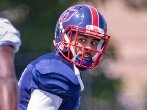 Ciante Evans looks over his shoulder during practice
