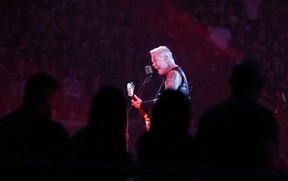James Hetfield at the mic during a Metallica concert