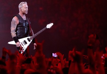 Frontman James Hetfield looks out at the crowd during a Metallica concert