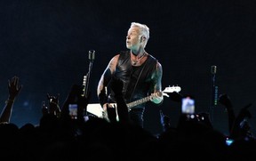 James Hetfield plays the guitar during a Metallica concert