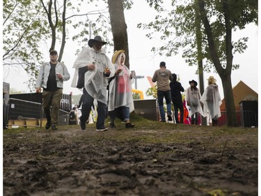 It was mucky in places at the rainy Lasso country-music festival at Parc Jean-Drapeau in Montreal on Saturday, Aug. 19, 2023.