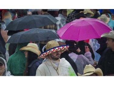 Rain falls at the Lasso country-music festival at Parc Jean-Drapeau in Montreal on Saturday, Aug. 19, 2023.