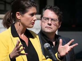 Quebec transport minister genevieve guilbault and education minister bernard drainville are seen speaking at a press conference about road safety