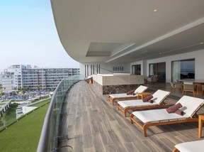 One of the deluxe suites at the new Royalton Splash Riviera Cancun has a private deck.