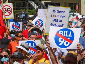 People gather at Dawson College for a rally to oppose Bill 96 in Montreal on May 14, 2022.