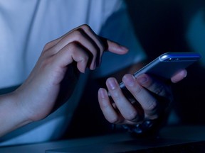 closeup of hands using a smartphone