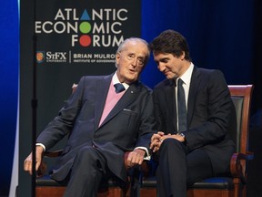 Prime Minister Justin Trudeau, right, and former prime minister Brian Mulroney speak during the Atlantic Economic Forum at St. Francis Xavier University in Antigonish, N.S. on Monday, June 19, 2023. THE CANADIAN PRESS/Darren Calabrese