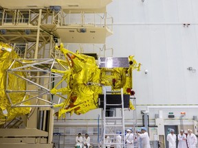 (This handout photograph taken and released by the Russian Space Agency Roscosmos on Aug. 1, 2023, shows technicians preparing the Luna-25 rover for the launch at the Vostochny cosmodrome, about 180 km north of Blagoveschensk, in the Amur region. The Luna-25 probe, Russia's first Moon mission in almost 50 years, has crashed on the moon after an incident during pre-landing manoeuvres, Russian space agency Roscosmos said on Sunday, Aug. 20, 2023.