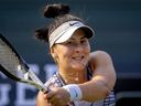 Canada's Bianca Andreescu hits a backhand to Britain's Sonay Kartal during their WTA tour tennis match in Bad Homburg, Germany, Monday, June 26, 2023. Andreescu says she still approaches each match like a Grand Slam champion, because she is one.
