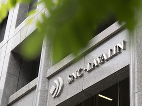 SNC-Lavalin Group Inc. headquarters is seen in Montreal on Thursday, Aug.3, 2023.The head of Canada's largest private sector union is calling out SNC-Lavalin for firing the head of a union that represents hundreds of its engineers and other workers.THE CANADIAN PRESS/Christinne Muschi