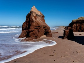 A beach with rocky outcroppings