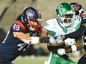 Frédéric Chagnon tackles a Roughriders player