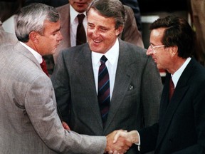 A June 3, 1987 photograph of (L-R) Ontario Premier David Peterson, Canadian Prime Minister Brian Mulroney and Quebec Premier Robert Bourassa at the Constitutional Conference where the Meech Lake Accord was agreed to. GAZETTE PHOTO BY PIERRE OBENDRAUF