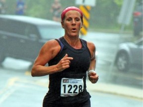 Paula Newhook runs during a marathon