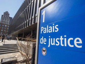 The Montreal courthouse sign is seen in this photo, it says palais de justice