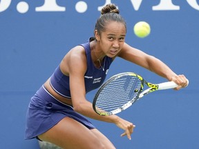 Canada's Leylah Fernandez is out of the U.S. Open after a 7-6 (4), 5-7, 6-4 loss to 22nd seed Ekaterina Alexandrova on Tuesday.&ampnbsp;Fernandez returns a shot to Ekaterina Alexandrova, of Russia, during the first round of the U.S. Open tennis championships, in New York, Tuesday, Aug. 29, 2023.