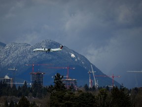 Chorus Aviation Inc. says pilots at its subsidiary Jazz Aviation have ratified changes to its collective agreement, even as the union filed an unfair labour practice complaint against Jazz. An Air Canada Express aircraft on approach to land at Vancouver International Airport in Richmond, B.C., Tuesday, April 11, 2023.