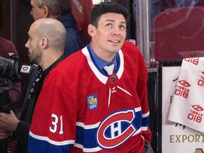 Carey Price looks up near the bench at the Bell Centre