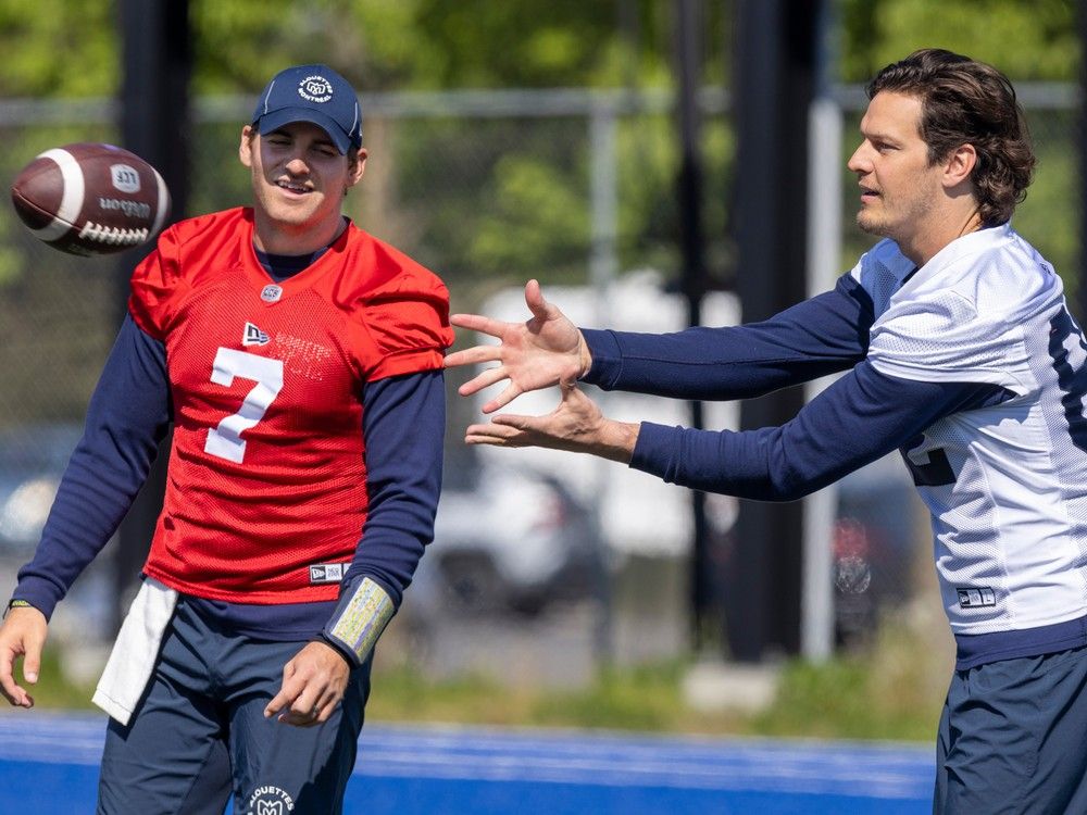 Montreal, Canada. 01st July, 2023. Montreal Alouettes quarterback Cody  Fajardo (7) hands off to running back William Stanback during first half  CFL football action against the Winnipeg Blue Bombers in Montreal, Saturday