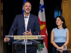 Jean-François Roberge at a city of Montreal podium with Mayor Valérie Plante beside him
