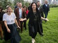 Valérie Plante arrives at Mount Royal Park with an entourage of Projet Montréal officials for the announcement of the proposed changes to the mountain.