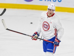 Logan Mailloux, in a white jersey and blue shorts, is seen at Canadiens rookie camp earlier this month.