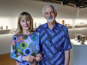 Montreal artist Simon Davies and his wife, Carmine Jensen, with the collection they have put together called Something's aJar, at Maison de la culture N.D.G. in Montreal, on Thursday, Sept. 14, 2023.