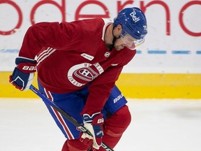 Canadiens forward Tanner Pearson is seen sporting a red jersey and blue shorts during a scrimmage in Brossard on Thursday during training camp.