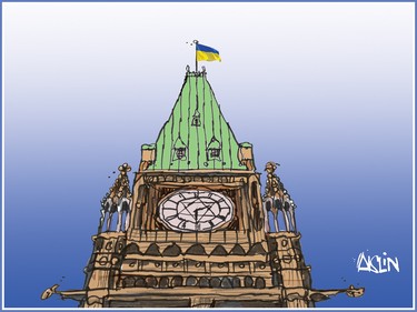 There is a Ukrainian flag atop the clock tower of Parliament.