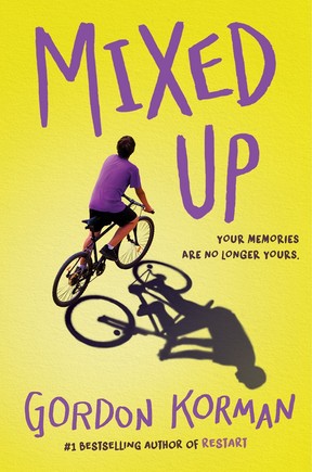 An illustration of a boy on a bicycle against a yellow background. The title Mixed Up and author Gordon Korman's name are superimposed.