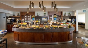 A large, circular buffet with wood accents.