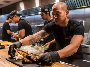 Chef Tota Oung prepping a dish.