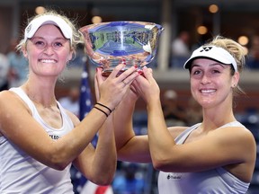 Gabriela Dabrowski, right, of Ottawa and partner Erin Routliffe of New Zealand celebrate after defeating Laura Siegemund of Germany and Vera Zvonareva of Russia in their women's doubles final match on Day 14 of the 2023 U.S. Open at the USTA Billie Jean King National Tennis Center on Sunday, Sept. 10, 2023, in the Flushing neighbourhood of the Queens borough of New York City.