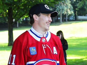 Brendan Gallagher sports the Canadiens' classic red home jersey at the team's golf tourney in Laval on Monday.