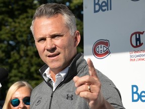 Canadiens head coach Martin St. Louis points his finger at the media during a scrum at the team's annual golf tourney on Monday.
