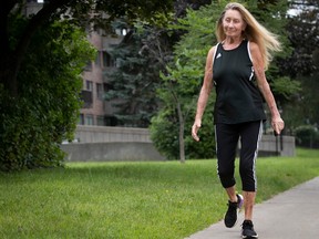 Maria Levitt, 86, takes a walk in her black running shoes and exercise clothes.