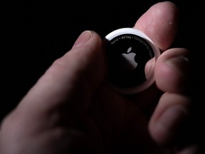 This file photo illustration taken on February 13, 2023, shows an Apple AirTag
