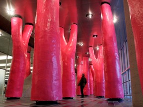 The neon-pink concrete tree trunks in Claude Cormier's Nature Legere/Lipstick Forest at the Palais des congrés are reproductions of real trees that line Park Ave.