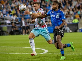 Chicago Fire FC's Rafael Czichos (5) and CF Montréal's Chinonso Offor race for the ball during second half MLS soccer action in Montreal on Saturday, Sept. 16, 2023.