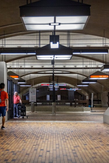 The Bonaventure Metro station in Montreal is characterized by brown tile floors and arched ceilings.